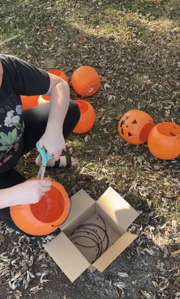 cutting handles off of pumpkin trick or treat buckets